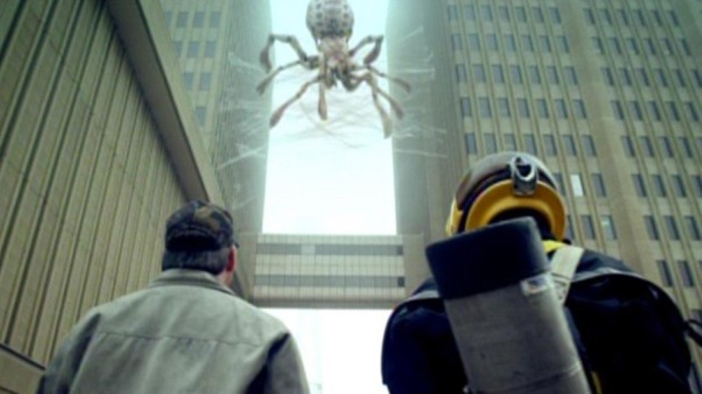 Arachnoquake web between skyscrapers